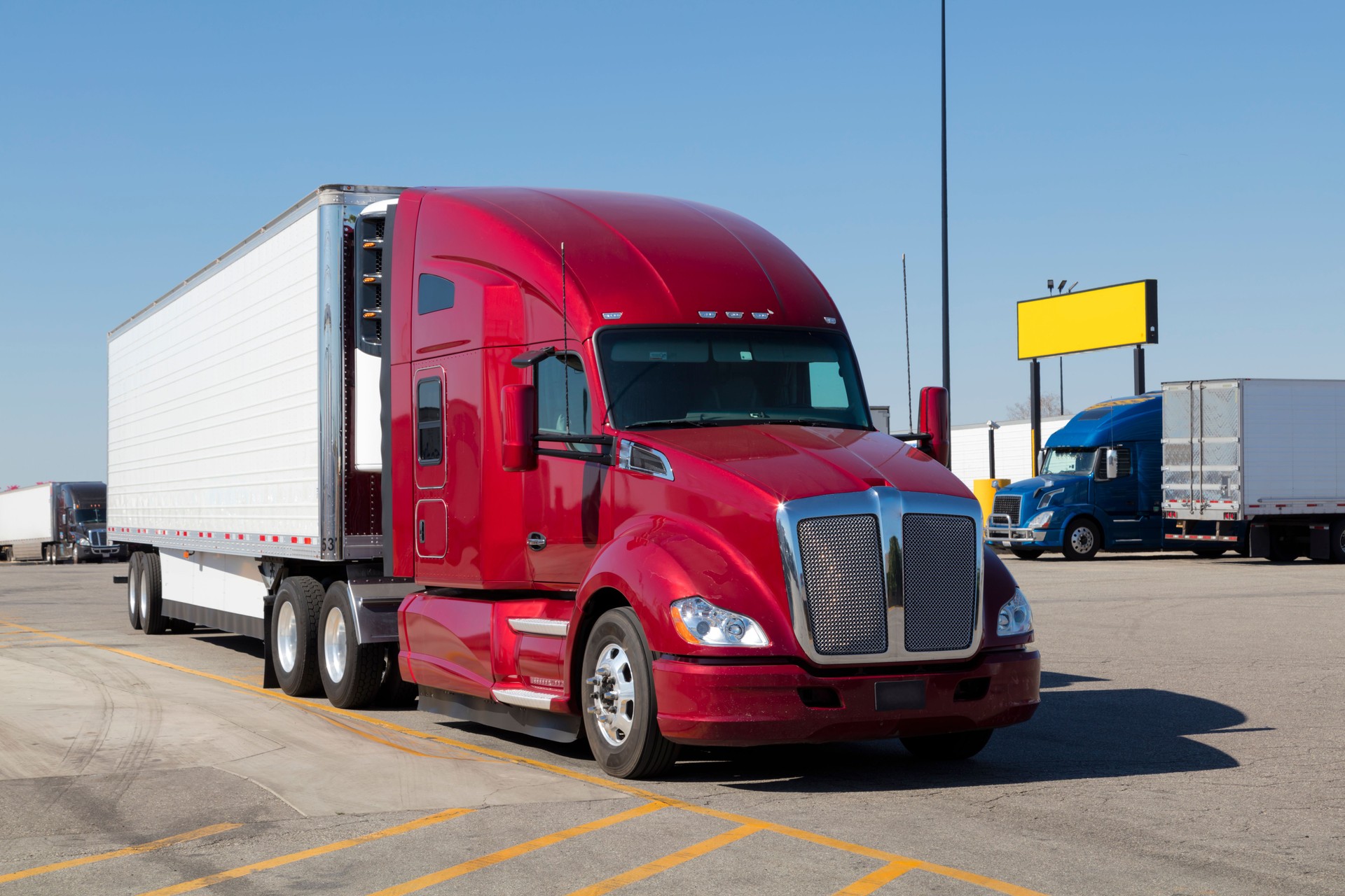 Red Truck Parked at Truck Stop